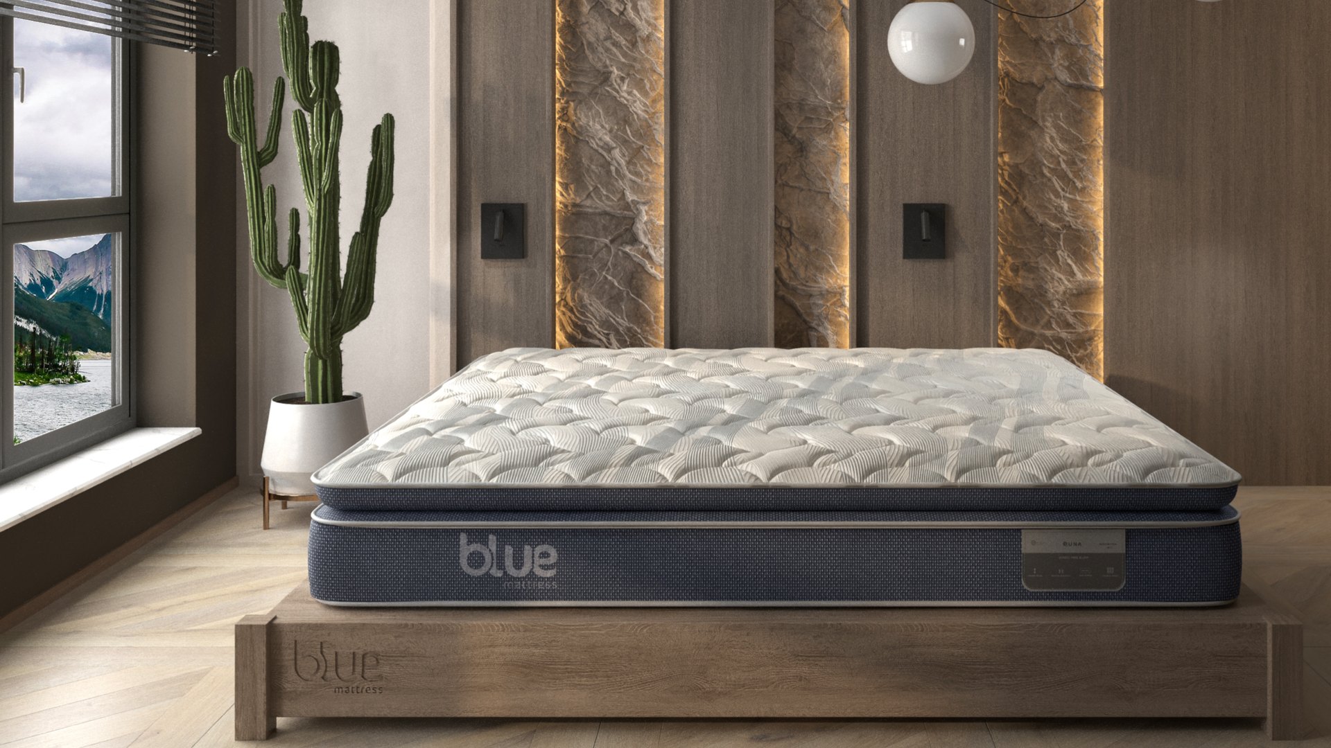 A Blue mattress made up in a calm, sunlit bedroom